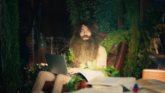 In Budget Direct’s new ad, a man goes missing in his man cave while searching for a better insurance deal